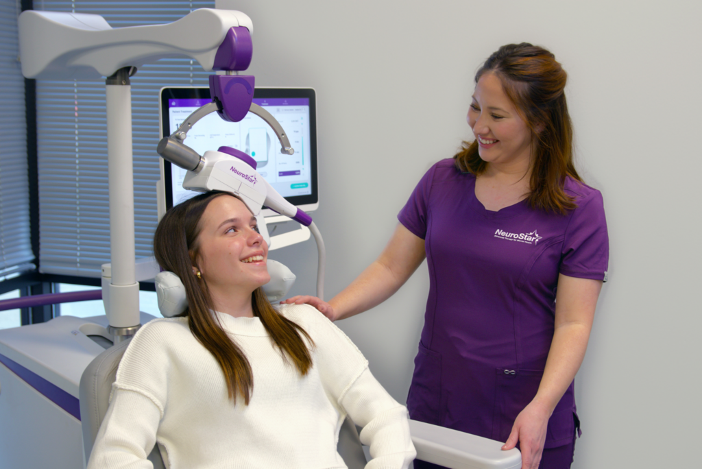 A teen smiles during a NeuroStar TMS session,  what is the success rate of TMS for younger patients?